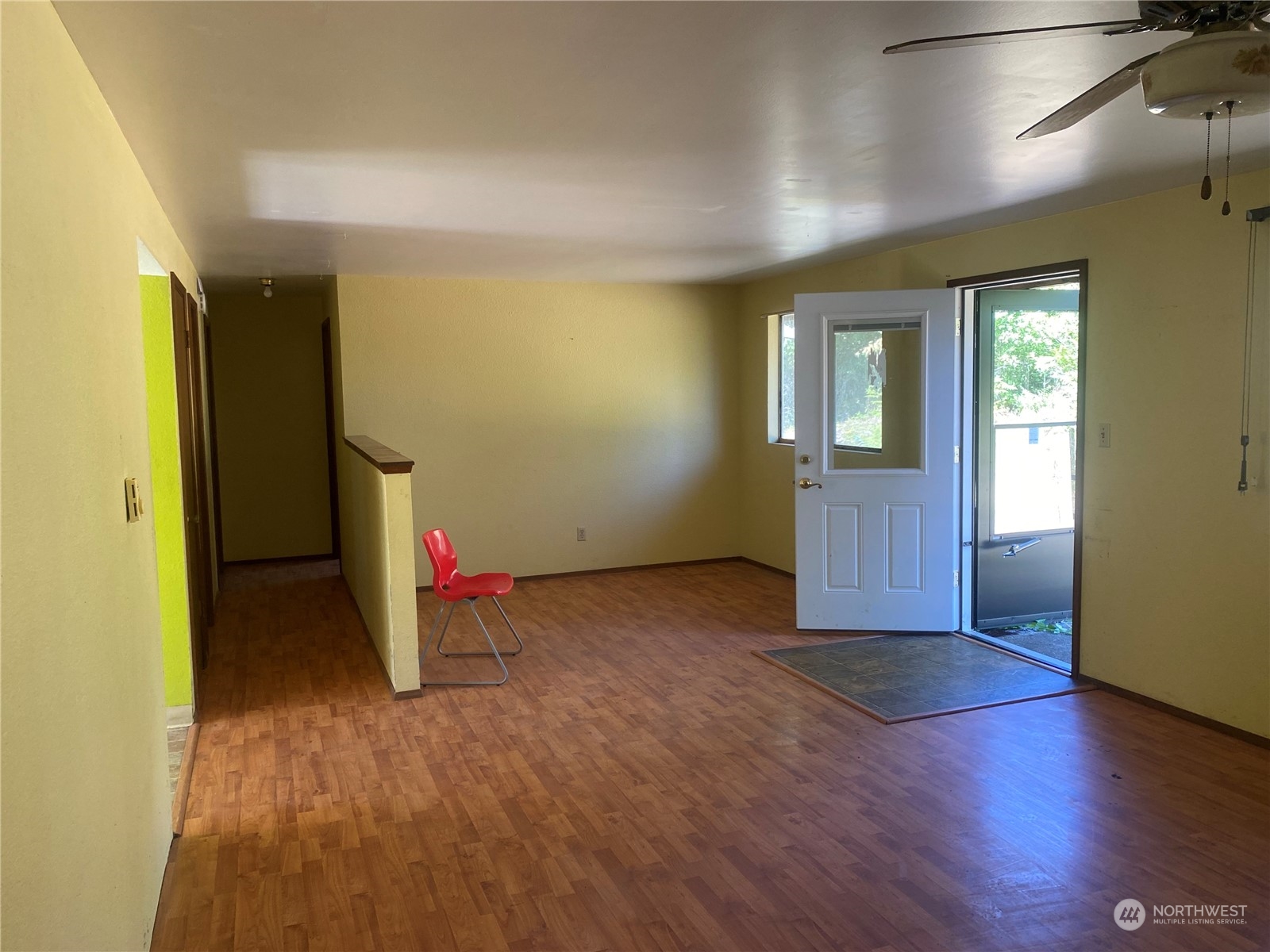 148 Ramsey Road Chehalis, WA 98532 - Photo 7 of 30 an empty room with wooden floor and windows