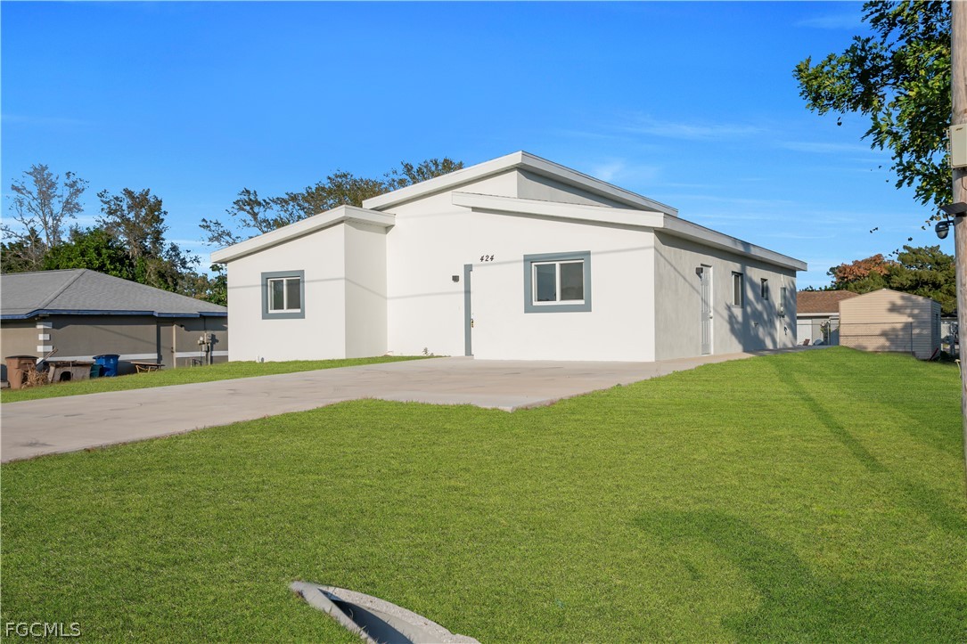 424 Alabama Road South Lehigh Acres, FL 33936 - Photo 2 of 28