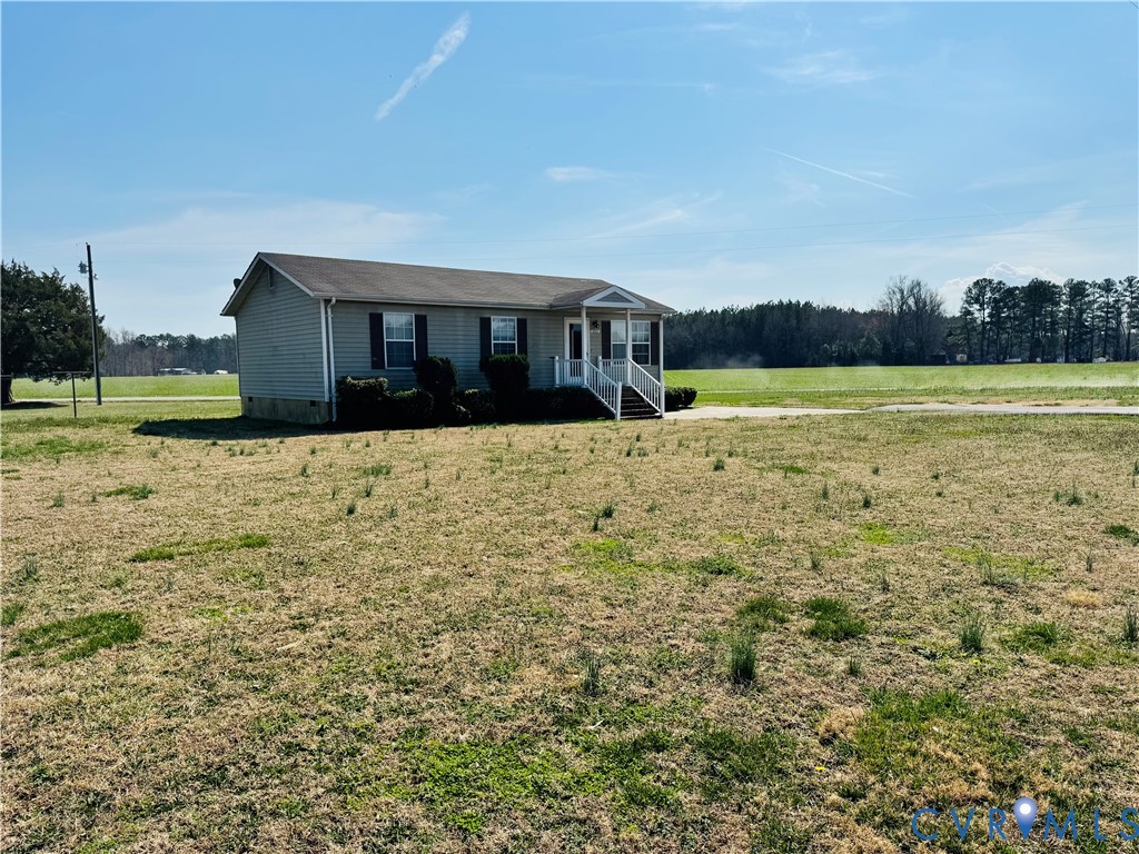 13531 Raynor Road Ivor, VA 23866 - Photo 15 of 16 a house view with a lake view