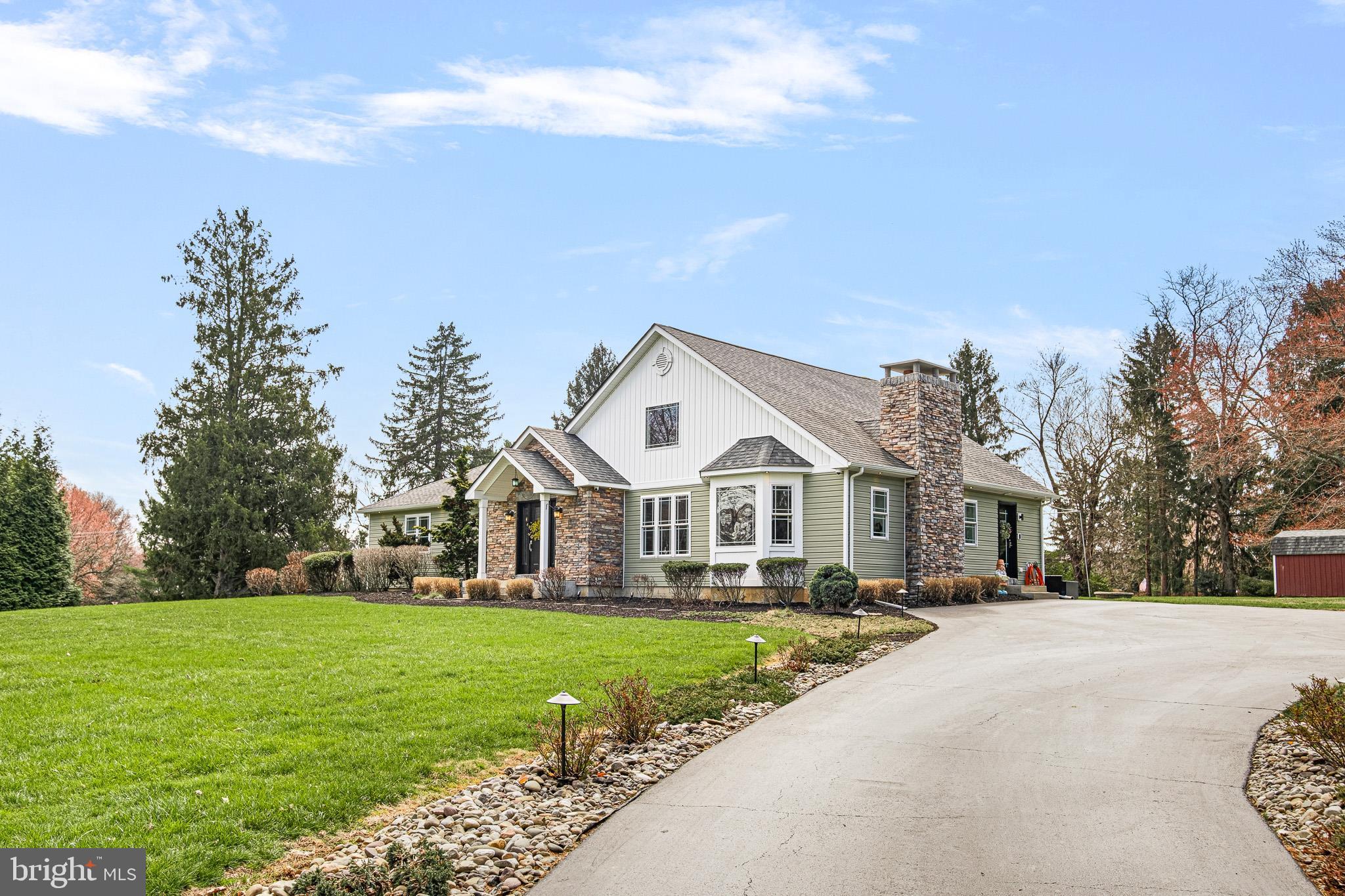 314 Concord Road Glen Mills, PA 19342 - Photo 2 of 42 a front view of a house with a yard