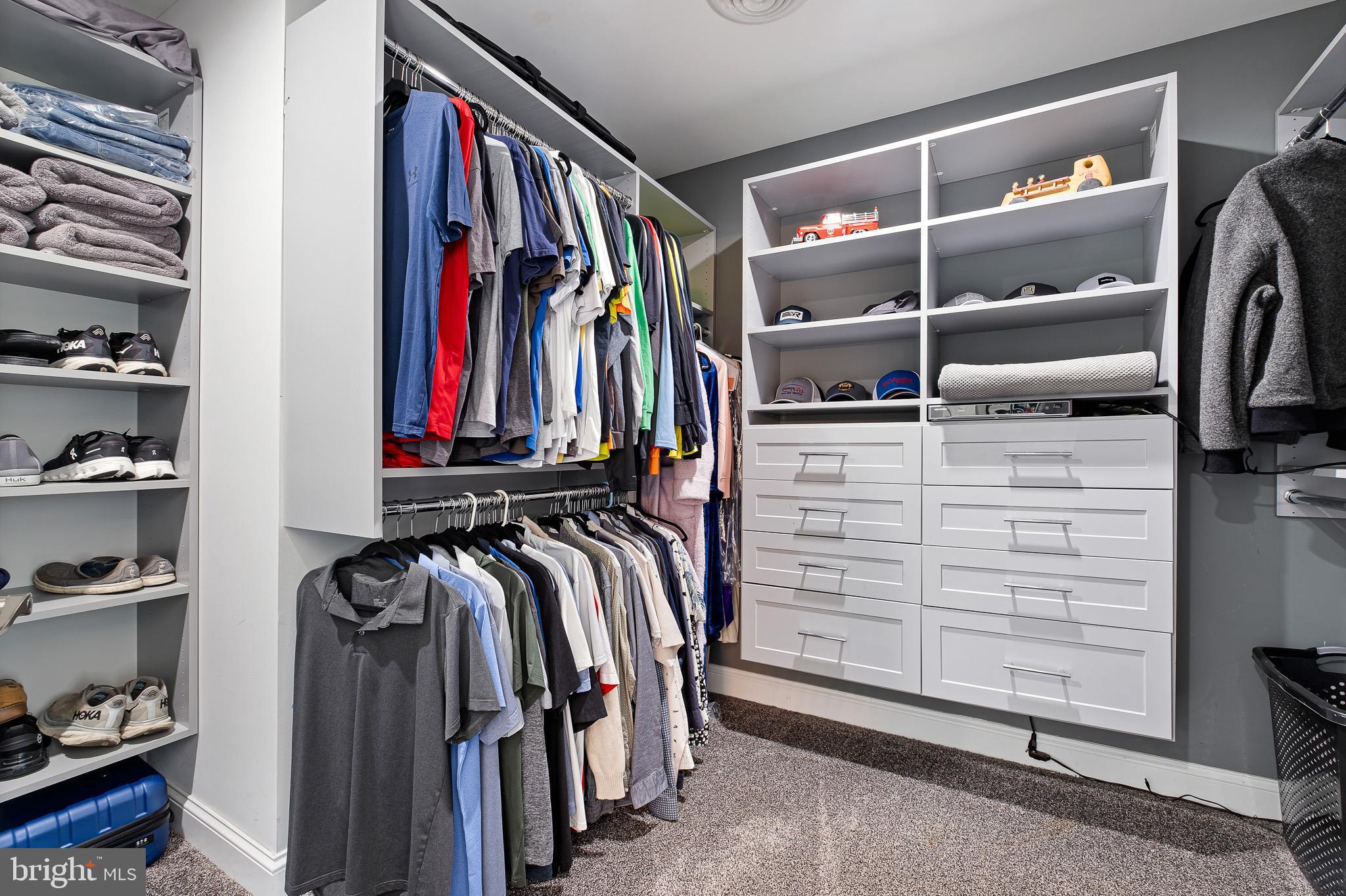314 Concord Road Glen Mills, PA 19342 - Photo 26 of 42 a view of walk in closet with clothes and shoes