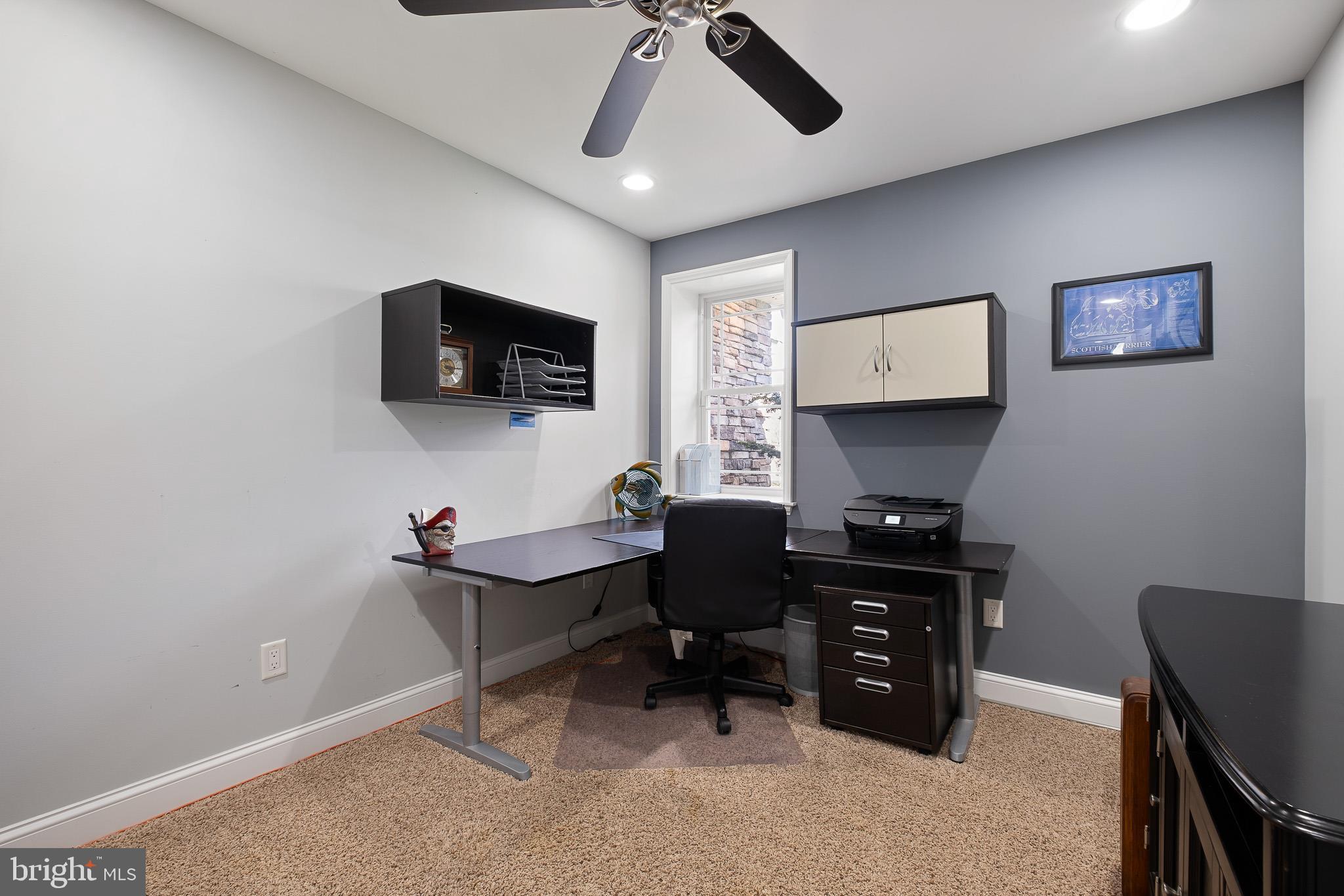 314 Concord Road Glen Mills, PA 19342 - Photo 32 of 42 a view of a workspace with a projector