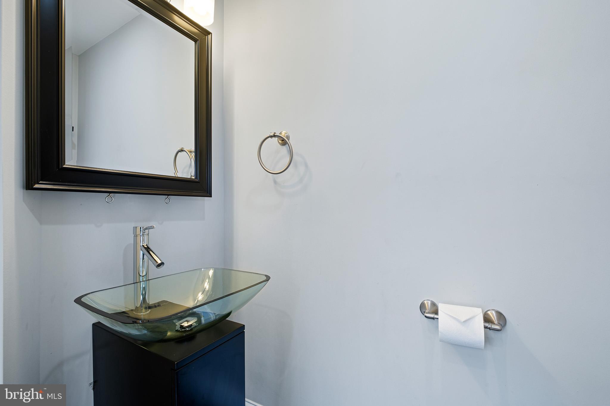 314 Concord Road Glen Mills, PA 19342 - Photo 34 of 42 a bathroom with a sink and a mirror