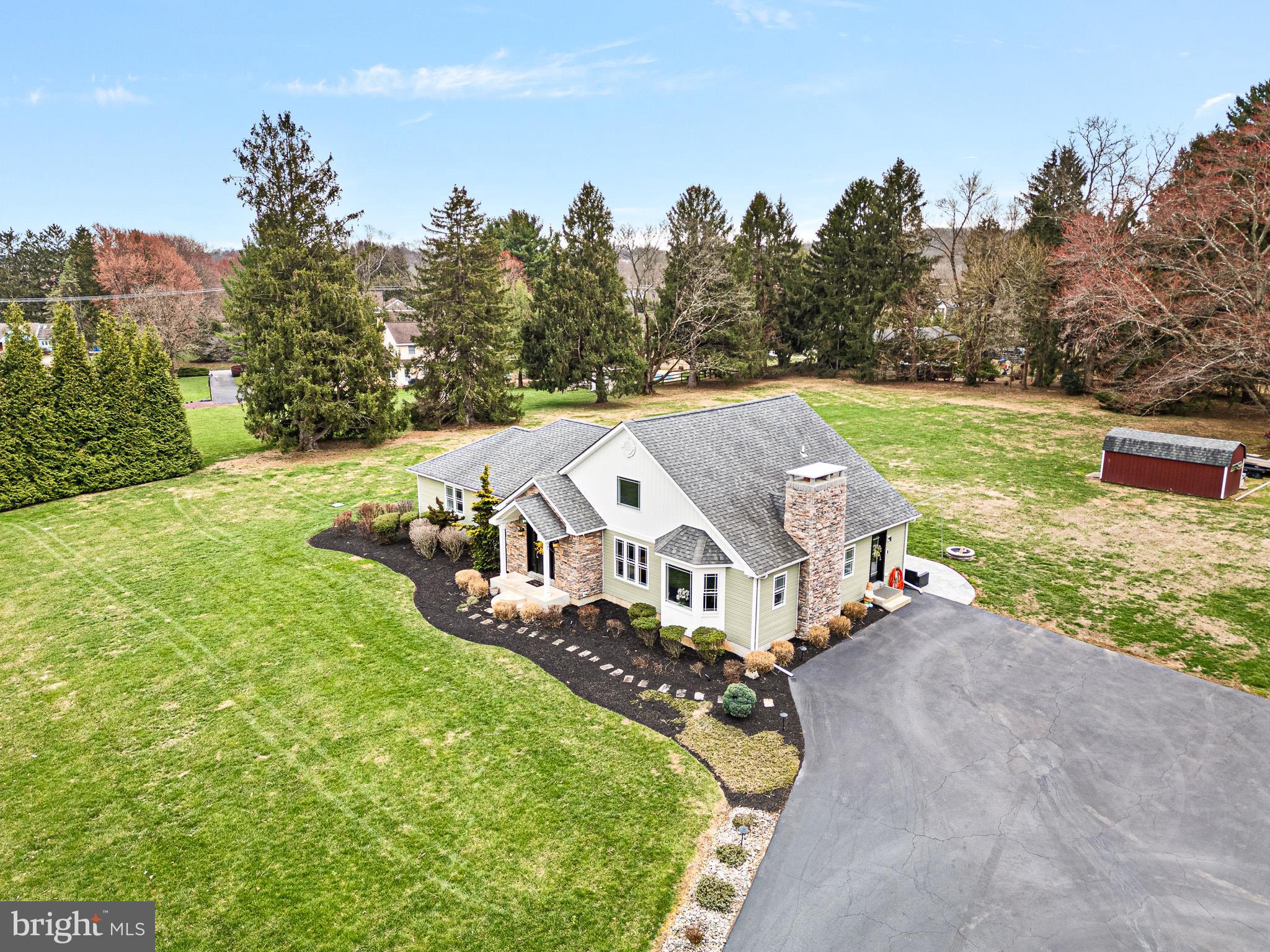 314 Concord Road Glen Mills, PA 19342 - Photo 4 of 42 aerial view of a house with big yard and large trees