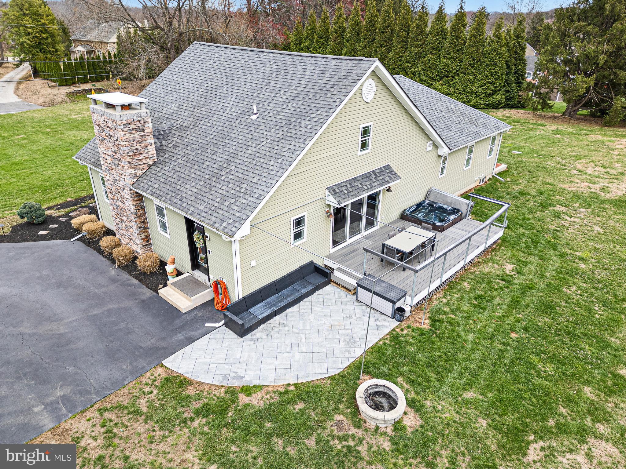 314 Concord Road Glen Mills, PA 19342 - Photo 5 of 42 an aerial view of a house with a yard