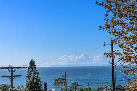 a bathroom with a toilet a sink and shower