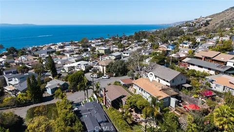 an aerial view of beach and ocean