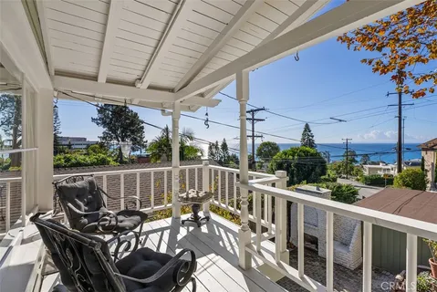 a view of a chairs and table in patio