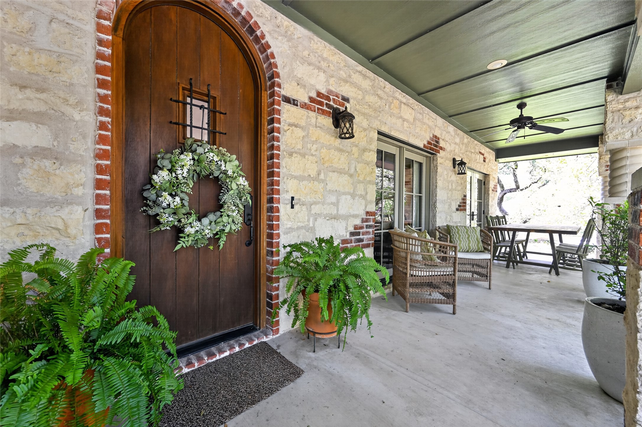 700 Willow Creek Road Salado, TX 76571 - Photo 4 of 39 Large covered front patio sets the tone for what's behind the door.