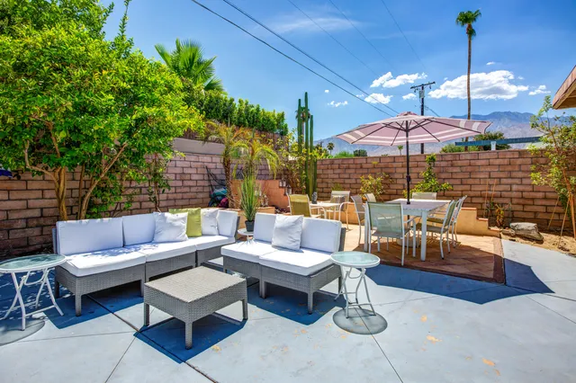 a outdoor space with patio lots of furniture