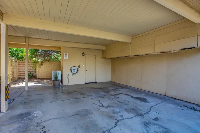 a view of empty room with floor to ceiling window