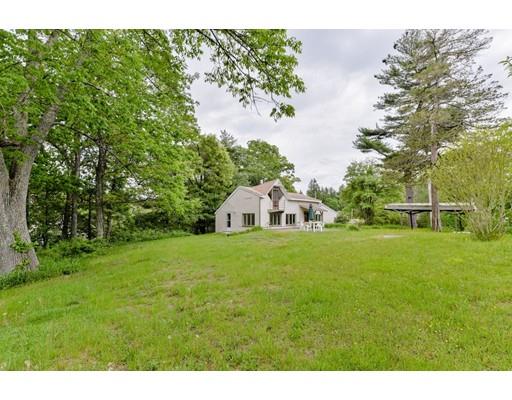 59 Indian Lane Canton, MA 02021 - Photo 21 of 25 a front view of a house with a yard