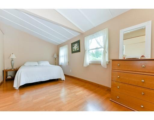 59 Indian Lane Canton, MA 02021 - Photo 7 of 25 a bedroom with a bed and window