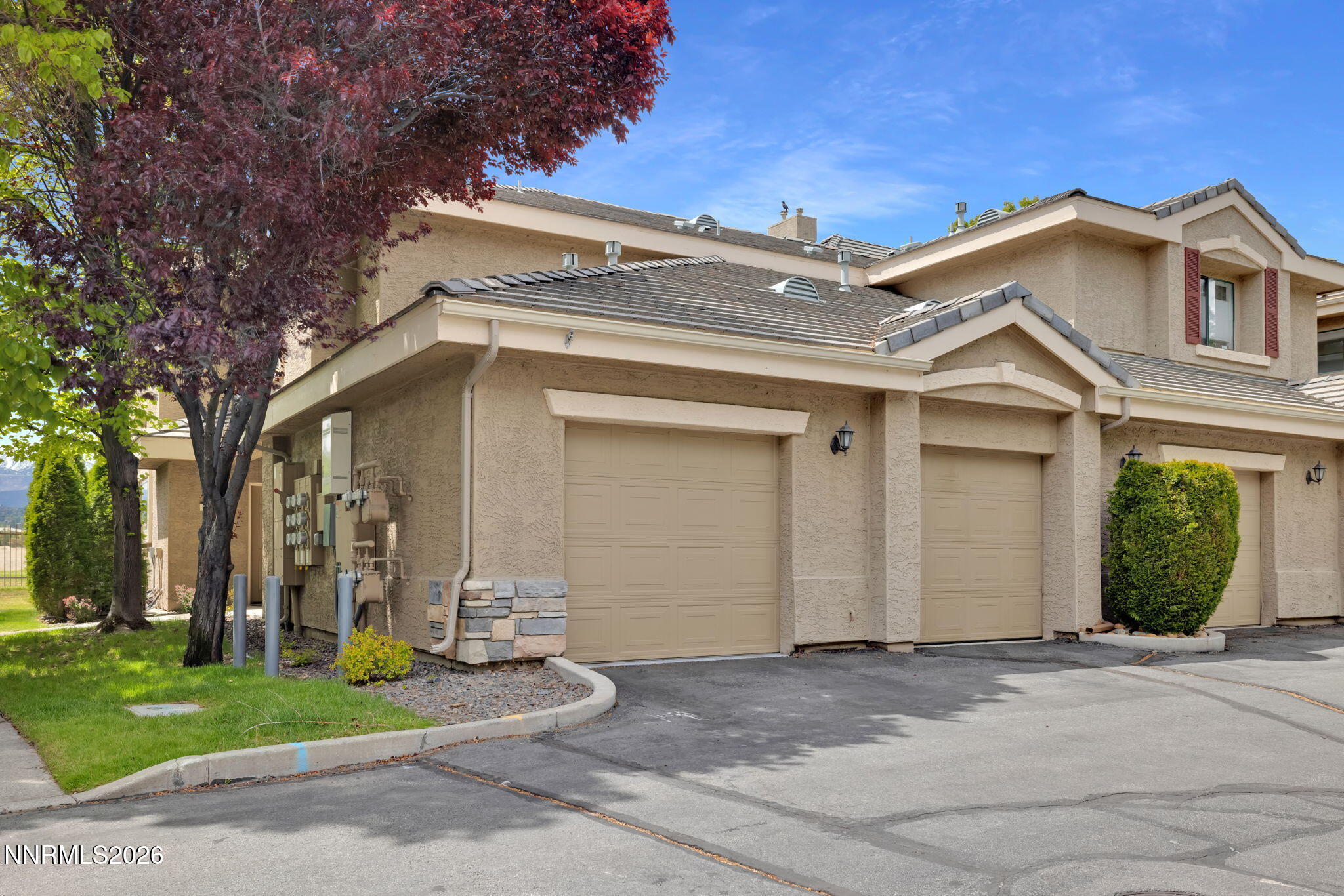 900 South Meadows Parkway, Unit 5121 Reno, NV 89521 - Photo 1 of 39 front view of a house with a yard
