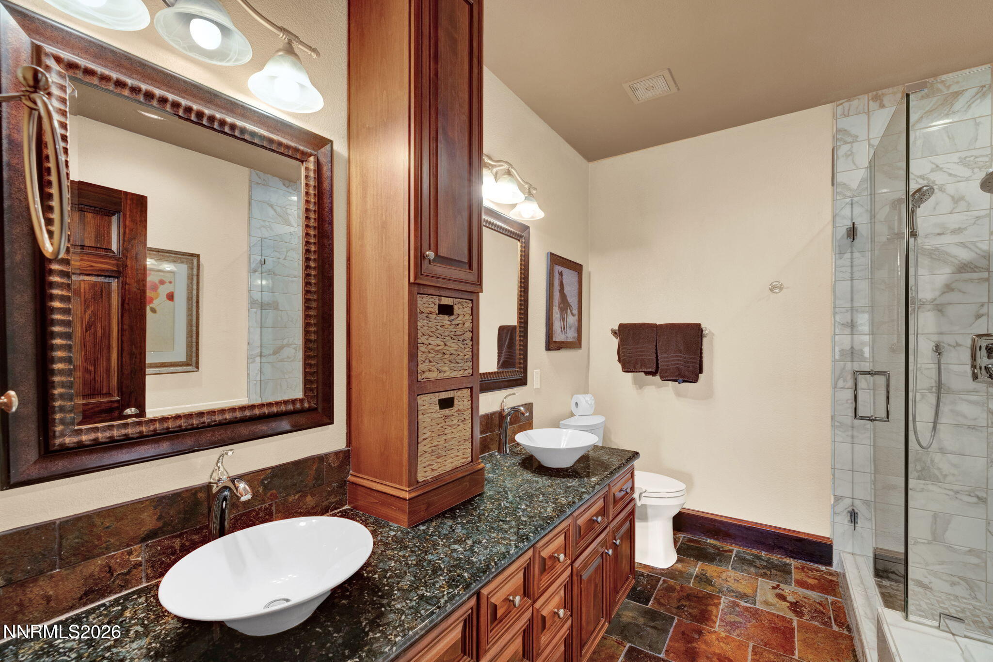 900 South Meadows Parkway, Unit 5121 Reno, NV 89521 - Photo 18 of 39 a bathroom with a granite countertop sink and a mirror