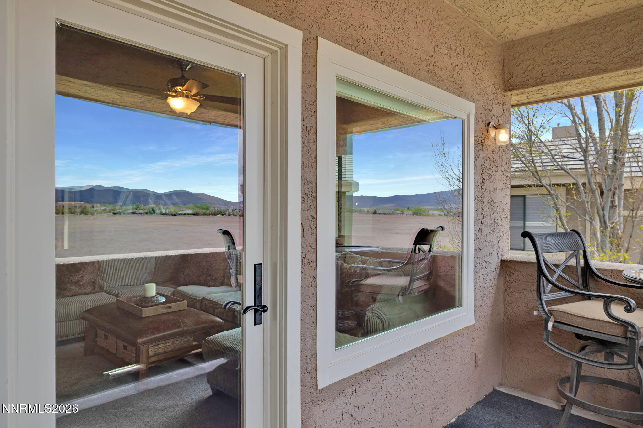 900 South Meadows Parkway, Unit 5121 Reno, NV 89521 - Photo 25 of 39 a room with furniture and a window