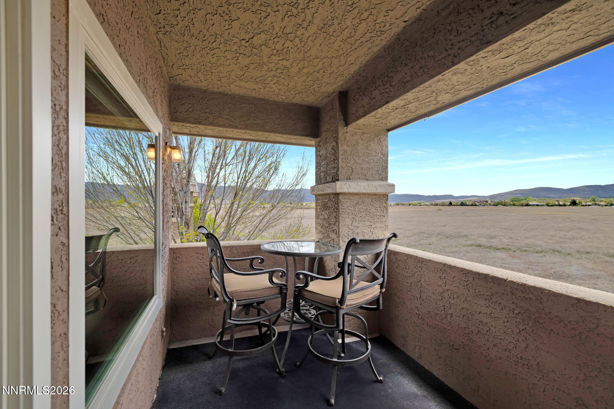 900 South Meadows Parkway, Unit 5121 Reno, NV 89521 - Photo 26 of 39 a view of an outdoor seating area