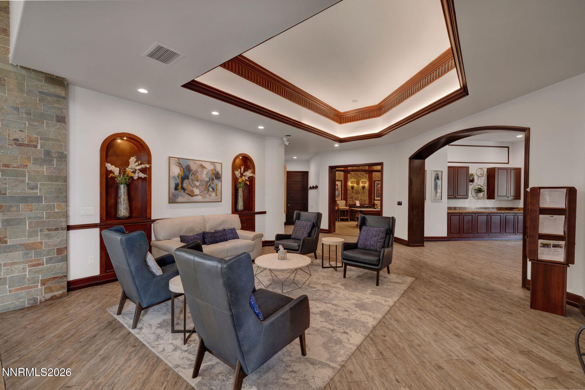 900 South Meadows Parkway, Unit 5121 Reno, NV 89521 - Photo 30 of 39 a living room with furniture and wooden floor
