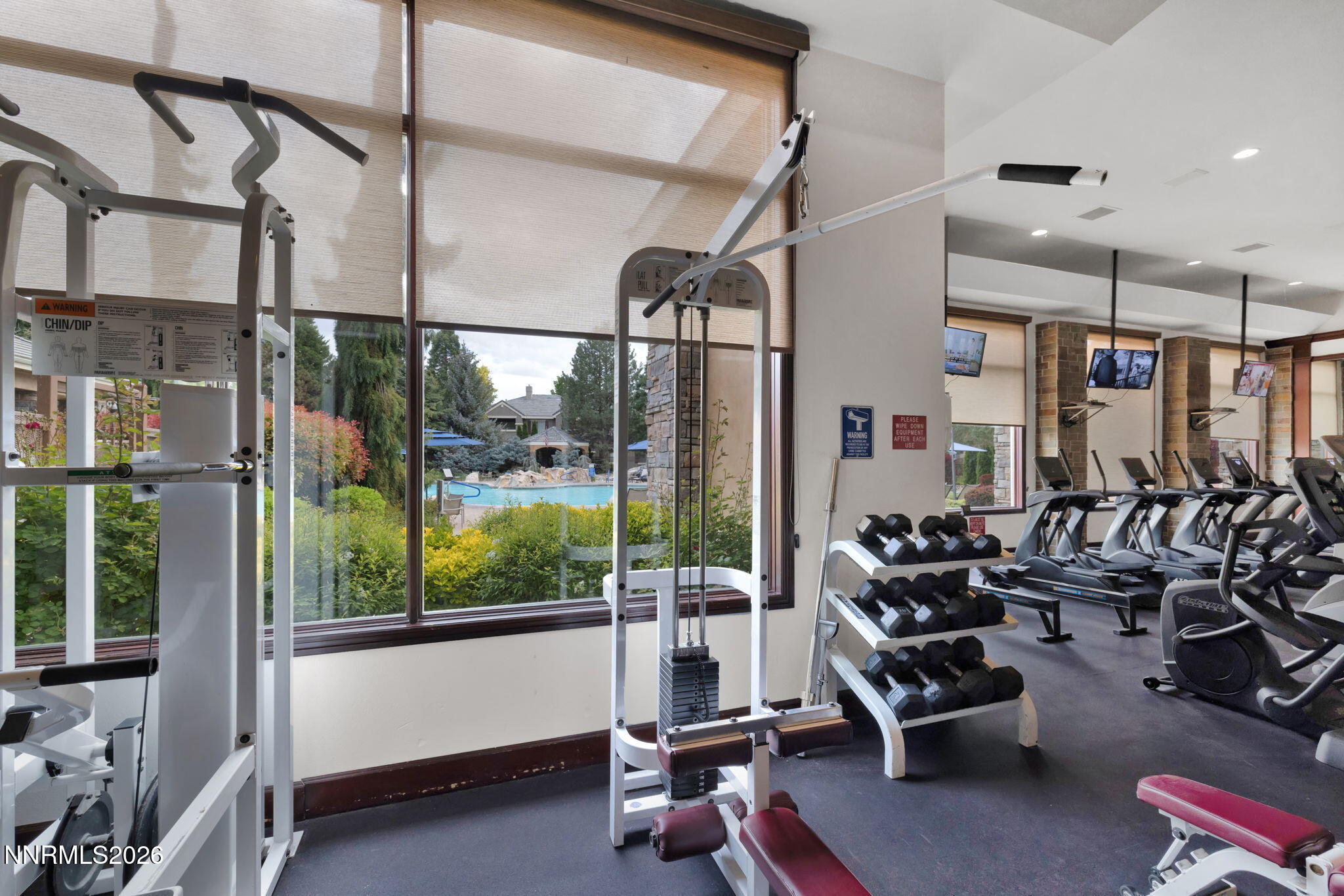 900 South Meadows Parkway, Unit 5121 Reno, NV 89521 - Photo 35 of 39 a room with gym equipment and a large window