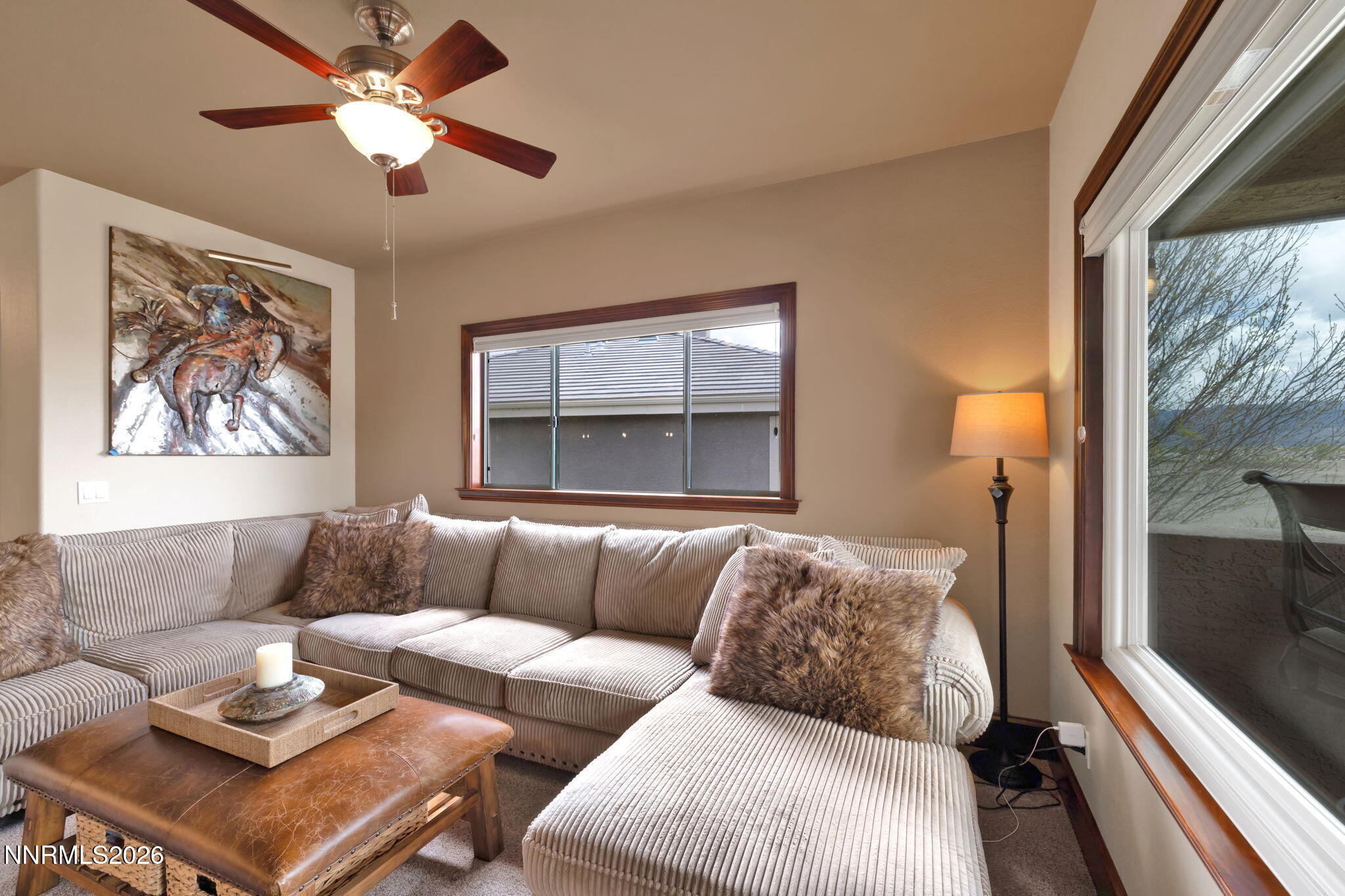 900 South Meadows Parkway, Unit 5121 Reno, NV 89521 - Photo 8 of 39 a living room with furniture and a large window