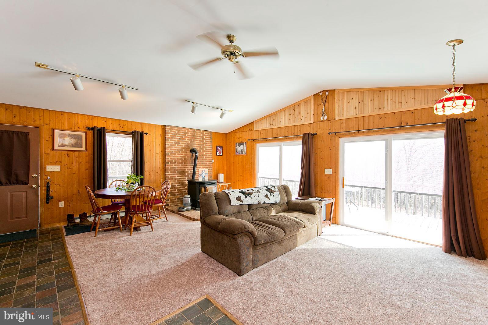 1574 Reynolds Road Cross Junction, VA 22625 - Photo 11 of 44 Family room with wood burning stove