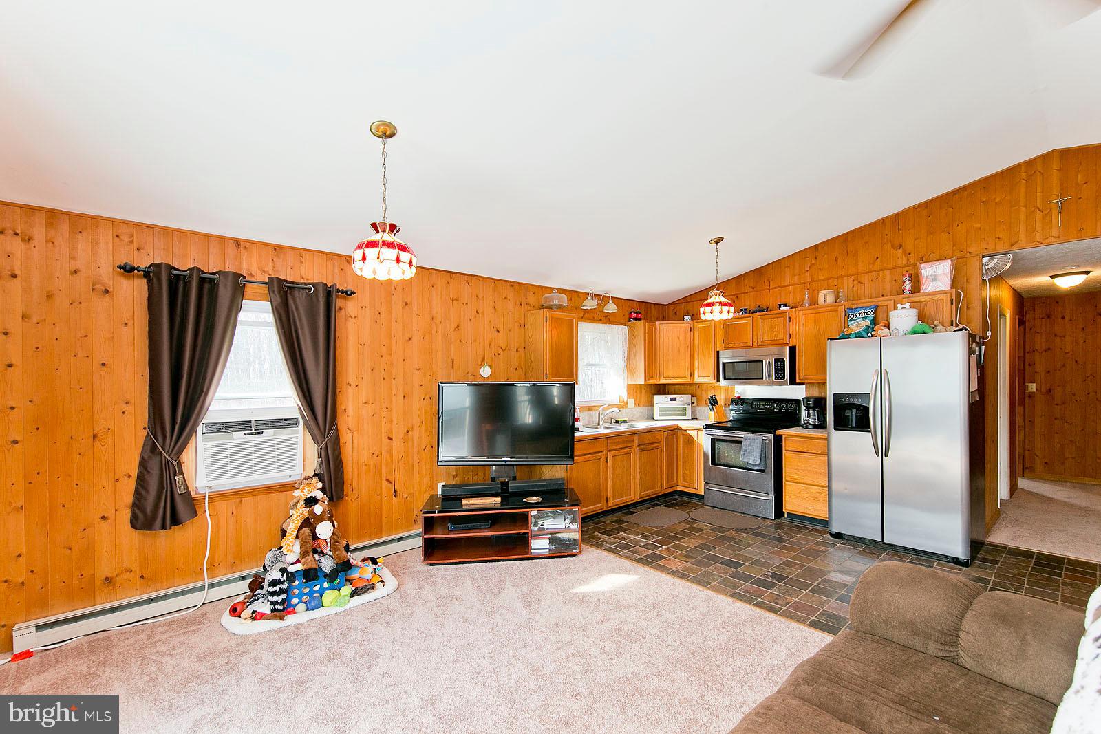 1574 Reynolds Road Cross Junction, VA 22625 - Photo 6 of 44 Family room opens to kitchen