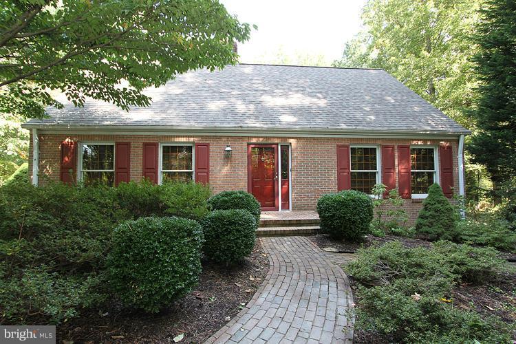 1200 Ashton Road Ashton, MD 20861 - Photo 1 of 30 a house view with a garden space