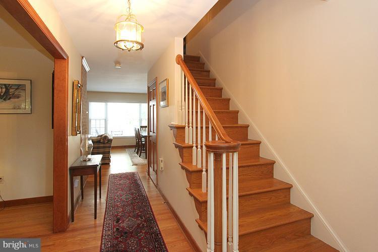 1200 Ashton Road Ashton, MD 20861 - Photo 2 of 30 a view of entryway and hall with wooden floor