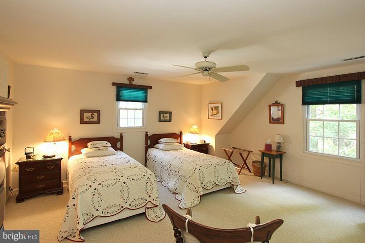 1200 Ashton Road Ashton, MD 20861 - Photo 15 of 30 a bedroom with two beds and a window