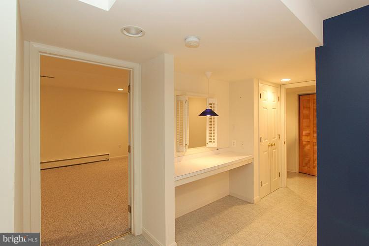 1200 Ashton Road Ashton, MD 20861 - Photo 17 of 30 a bathroom with a tub and a shower