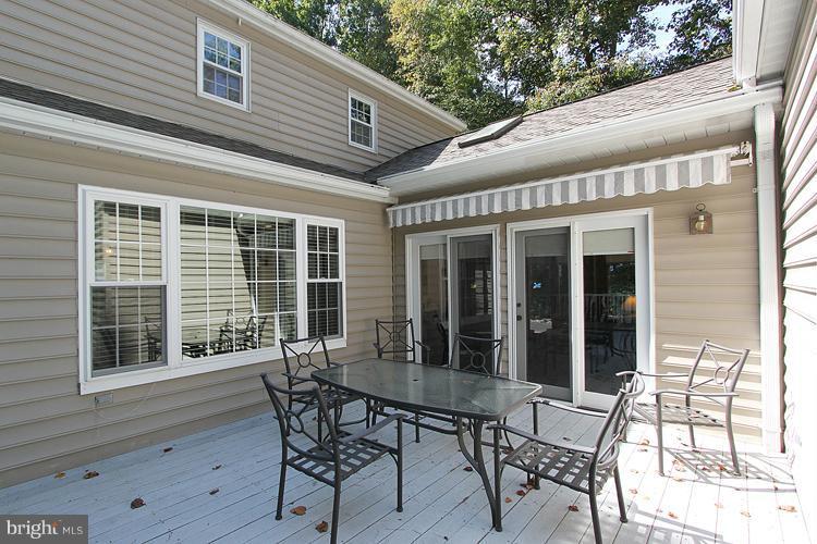 1200 Ashton Road Ashton, MD 20861 - Photo 20 of 30 a view of a house with backyard and sitting area
