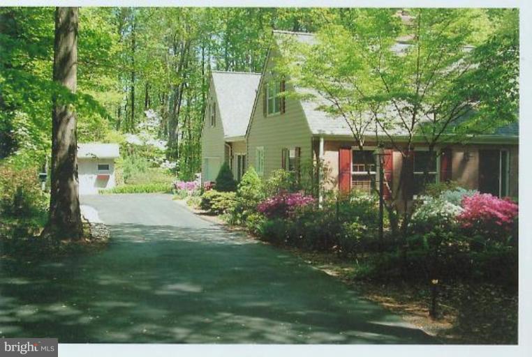 1200 Ashton Road Ashton, MD 20861 - Photo 29 of 30 a front view of a house with garden
