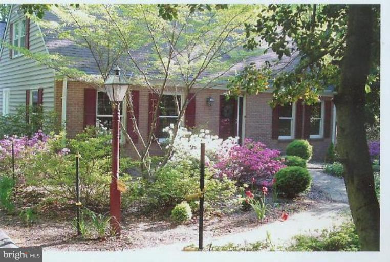 1200 Ashton Road Ashton, MD 20861 - Photo 30 of 30 a front view of a house with a yard and fountain