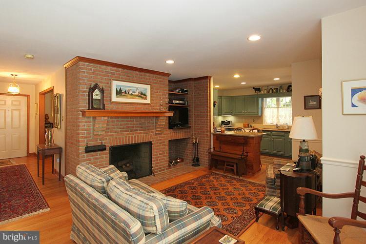 1200 Ashton Road Ashton, MD 20861 - Photo 7 of 30 a living room with furniture and a fireplace
