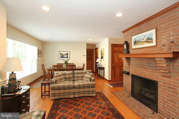 1200 Ashton Road Ashton, MD 20861 - Photo 8 of 30 a living room with furniture and a fireplace