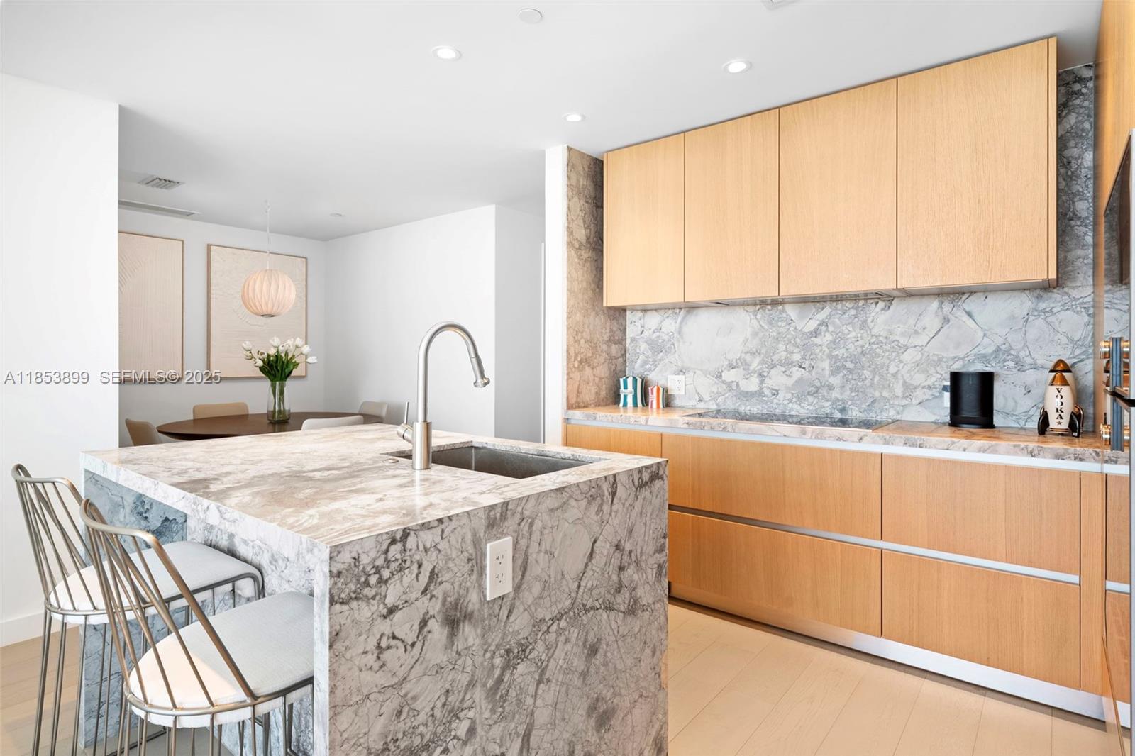 500 Alton Road, Unit 3604 Miami Beach, FL 33139 - Photo 6 of 45 a kitchen with stainless steel appliances granite countertop a sink a stove and a refrigerator