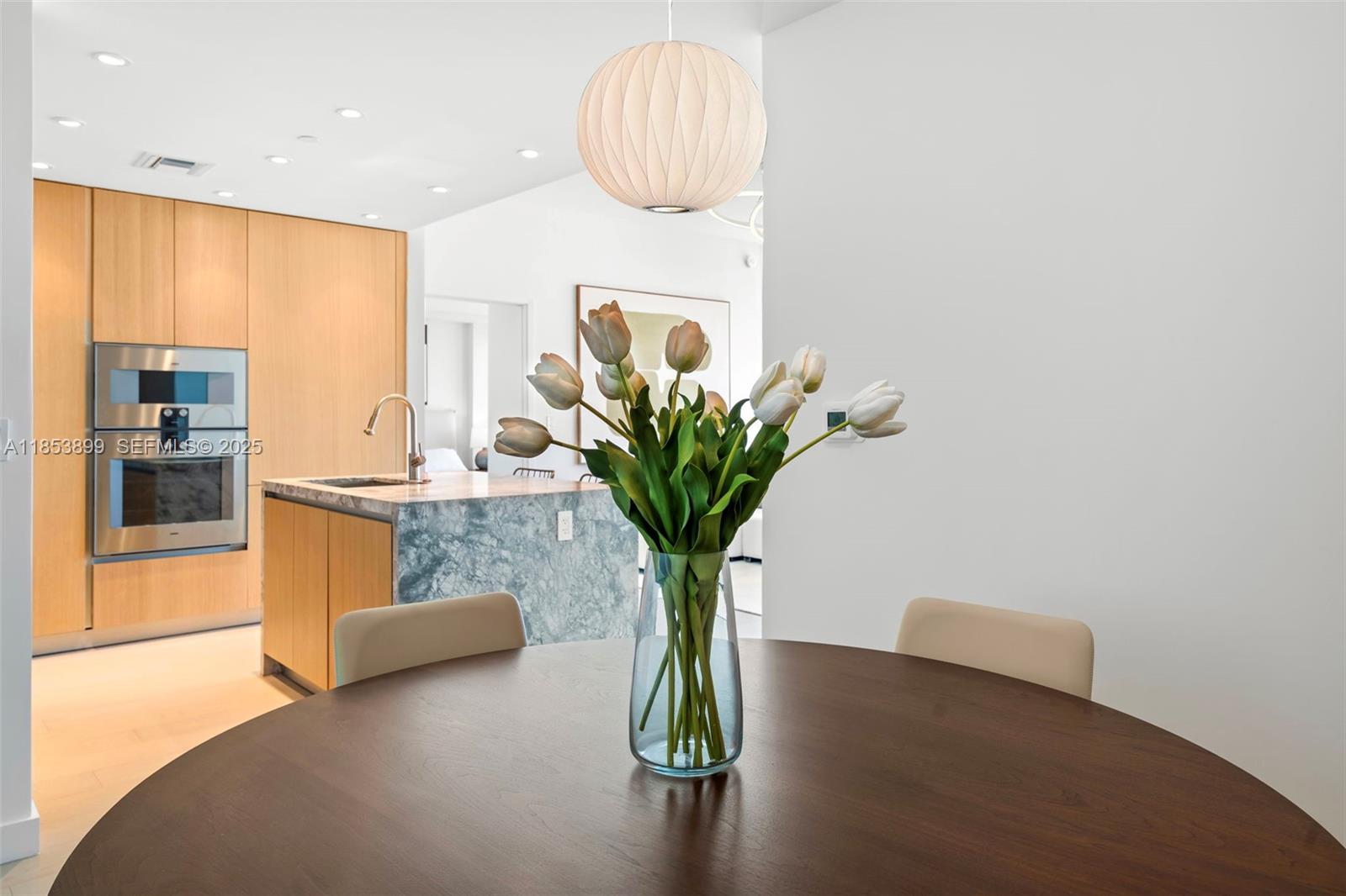 500 Alton Road, Unit 3604 Miami Beach, FL 33139 - Photo 9 of 45 a view of living room with furniture and a potted plant