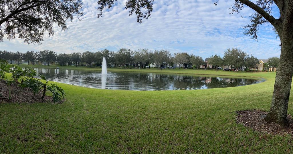 13638 Ancilla Boulevard Windermere, FL 34786 - Photo 4 of 16 a view of a lake with a mountain in the background
