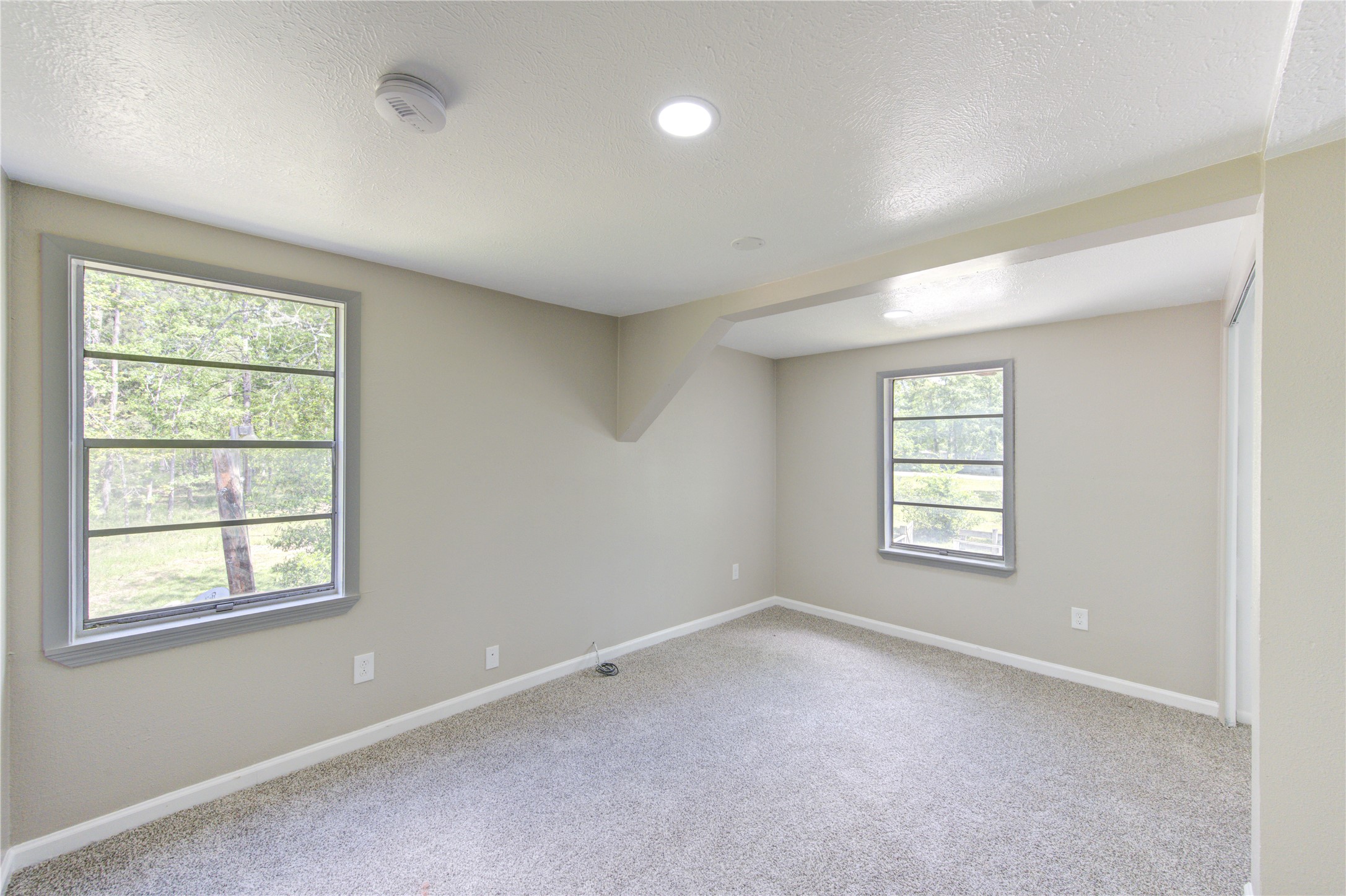 15170 McRae Lake Conroe, TX 77303 - Photo 15 of 25 a view of an empty room with a window