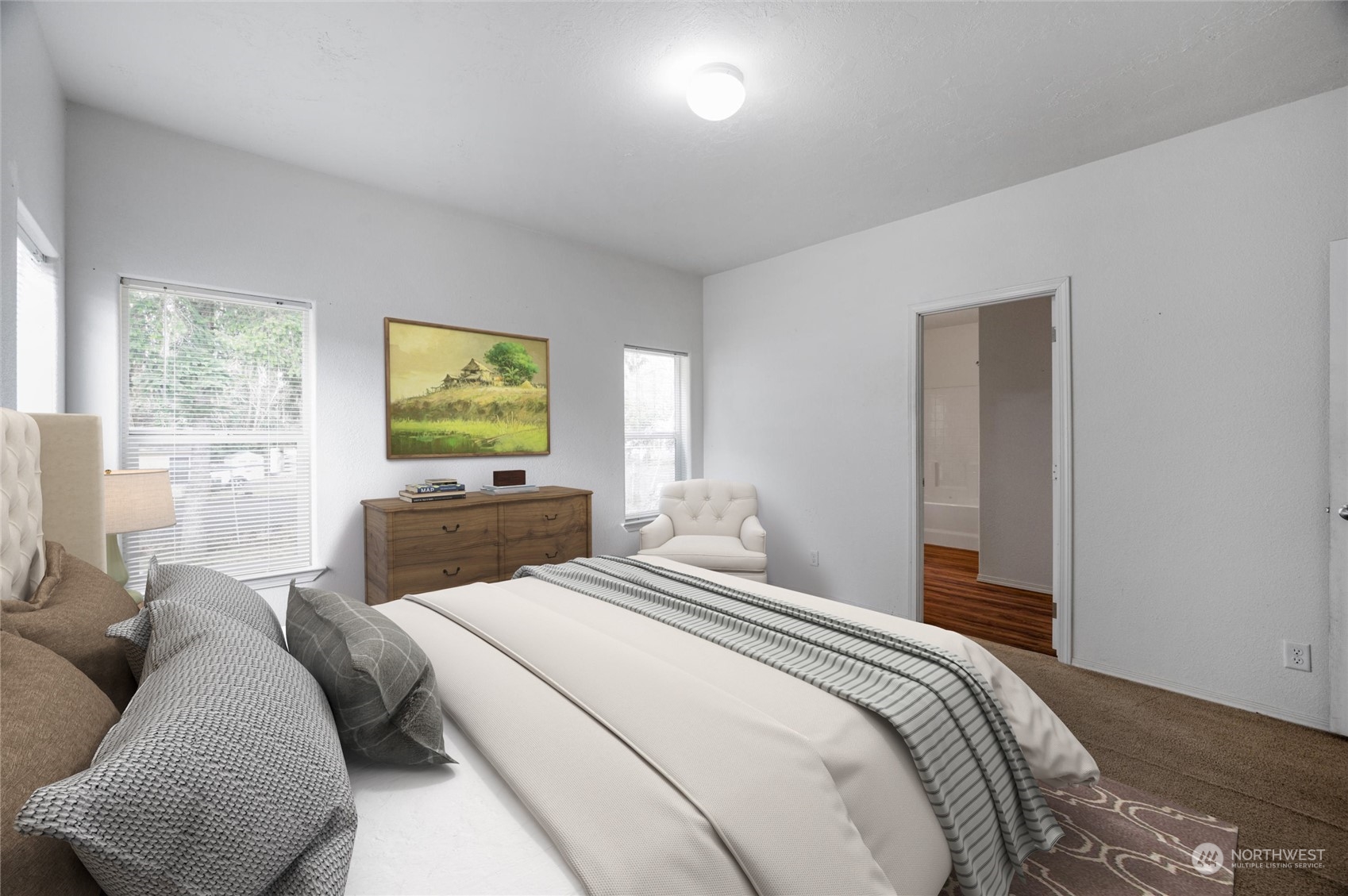 700 North Reed Street, Unit 21 Sedro-Woolley, WA 98284 - Photo 13 of 28 a bedroom with two beds and a large window