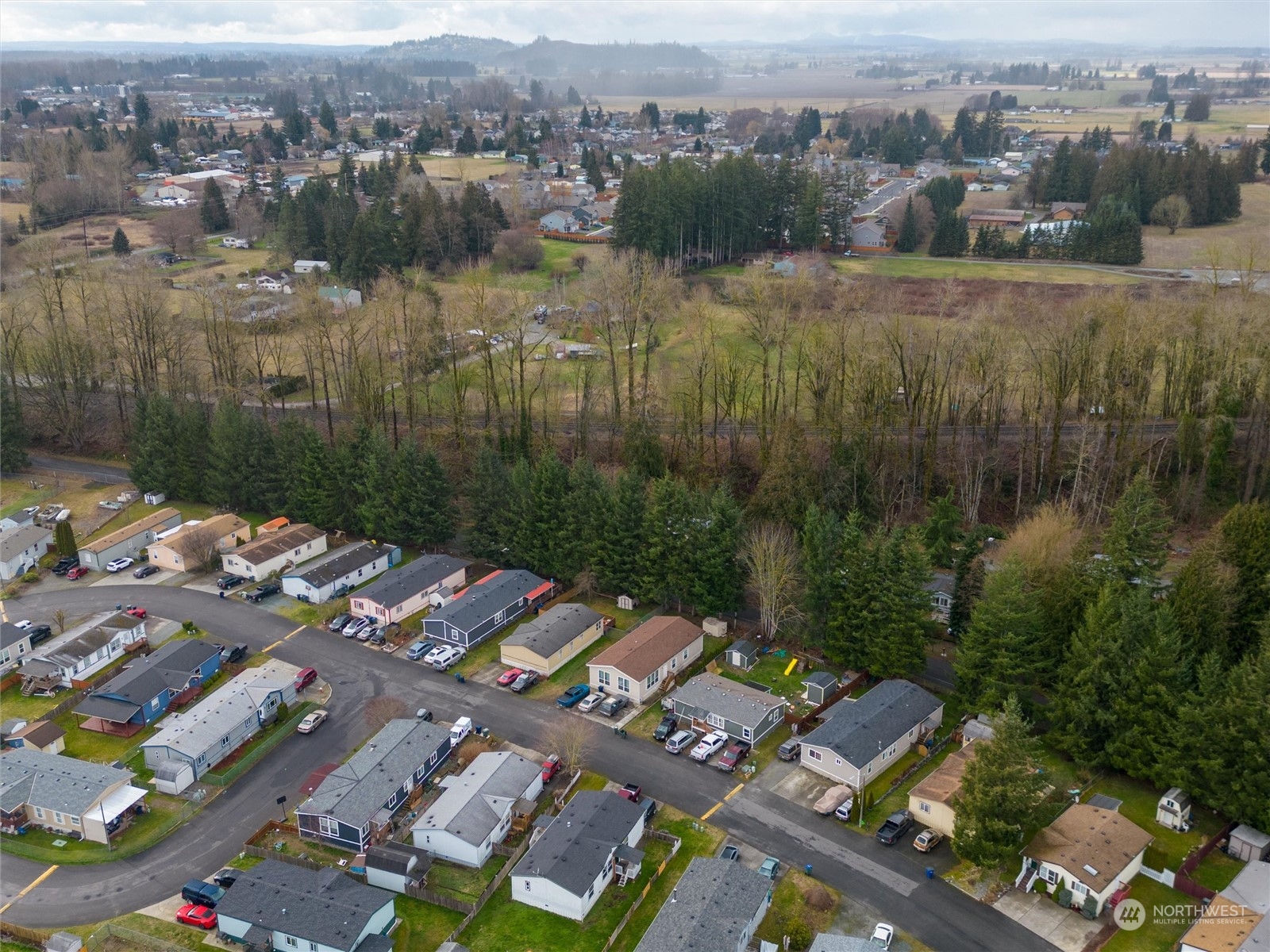 700 North Reed Street, Unit 21 Sedro-Woolley, WA 98284 - Photo 26 of 28 a view of a lake with a mountain