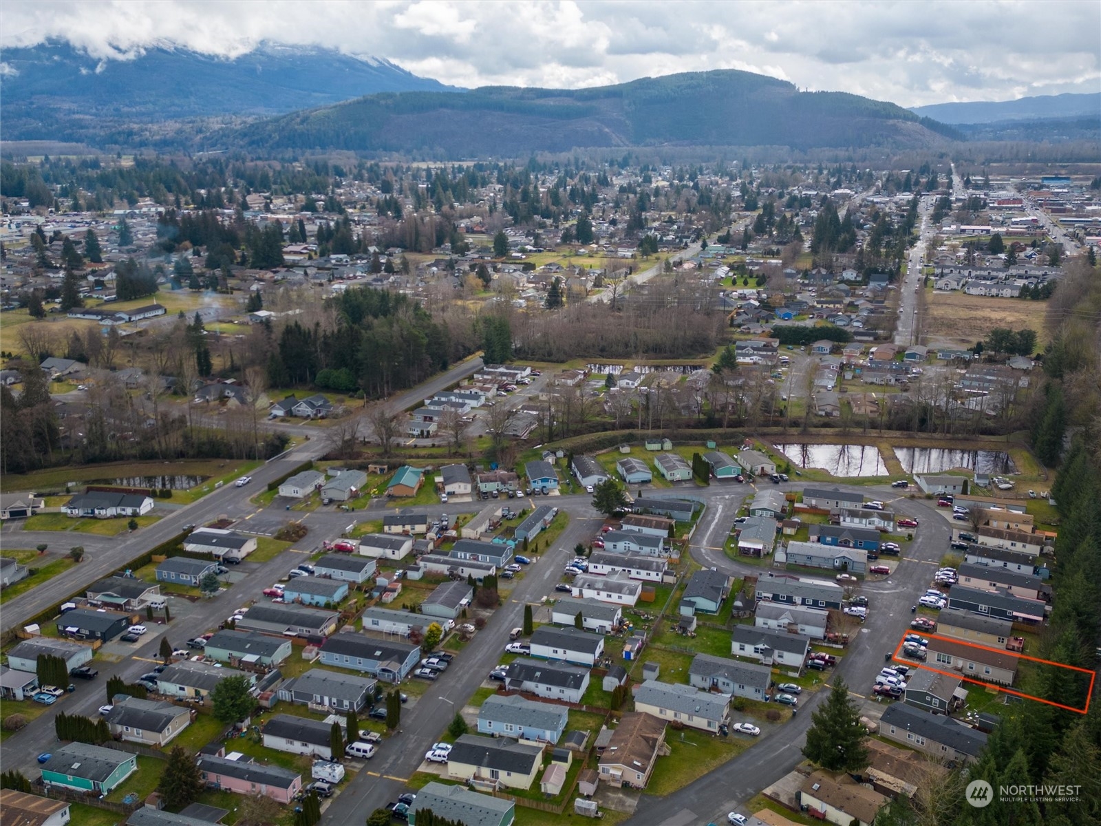 700 North Reed Street, Unit 21 Sedro-Woolley, WA 98284 - Photo 27 of 28 an aerial view of a city with lots of residential buildings