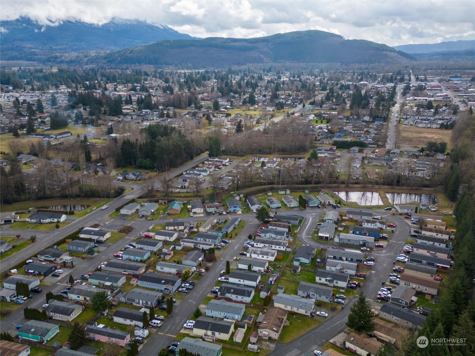 700 North Reed Street, Unit 21 Sedro-Woolley, WA 98284 - Photo 28 of 28 an aerial view of residential houses with city view