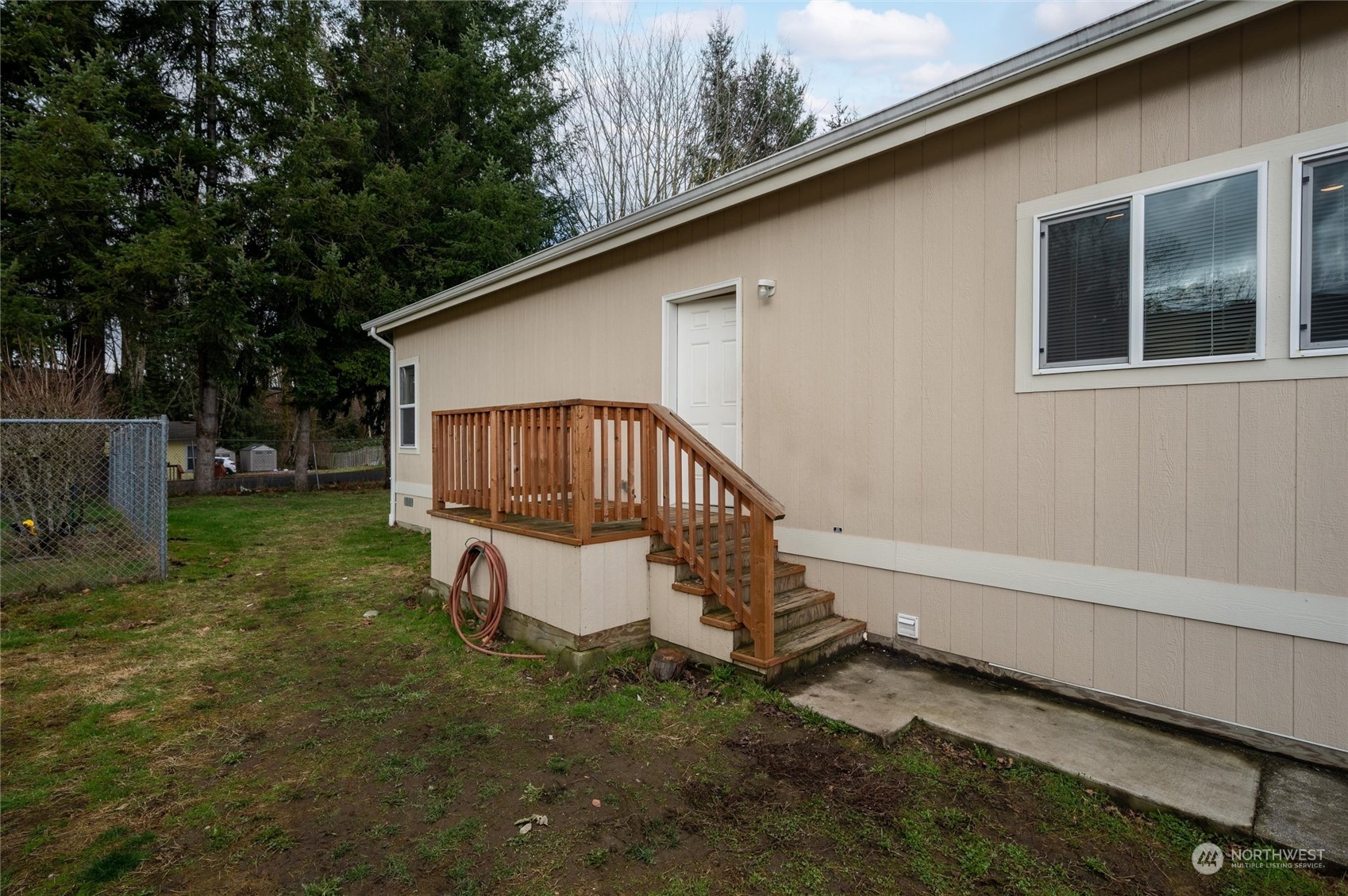 700 North Reed Street, Unit 21 Sedro-Woolley, WA 98284 - Photo 3 of 28 a view of a house with a yard