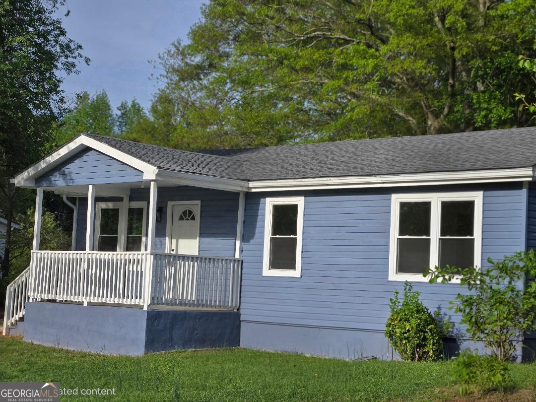 74 Carver Road McDonough, GA 30253 - Photo 2 of 19 a view of house with a yard