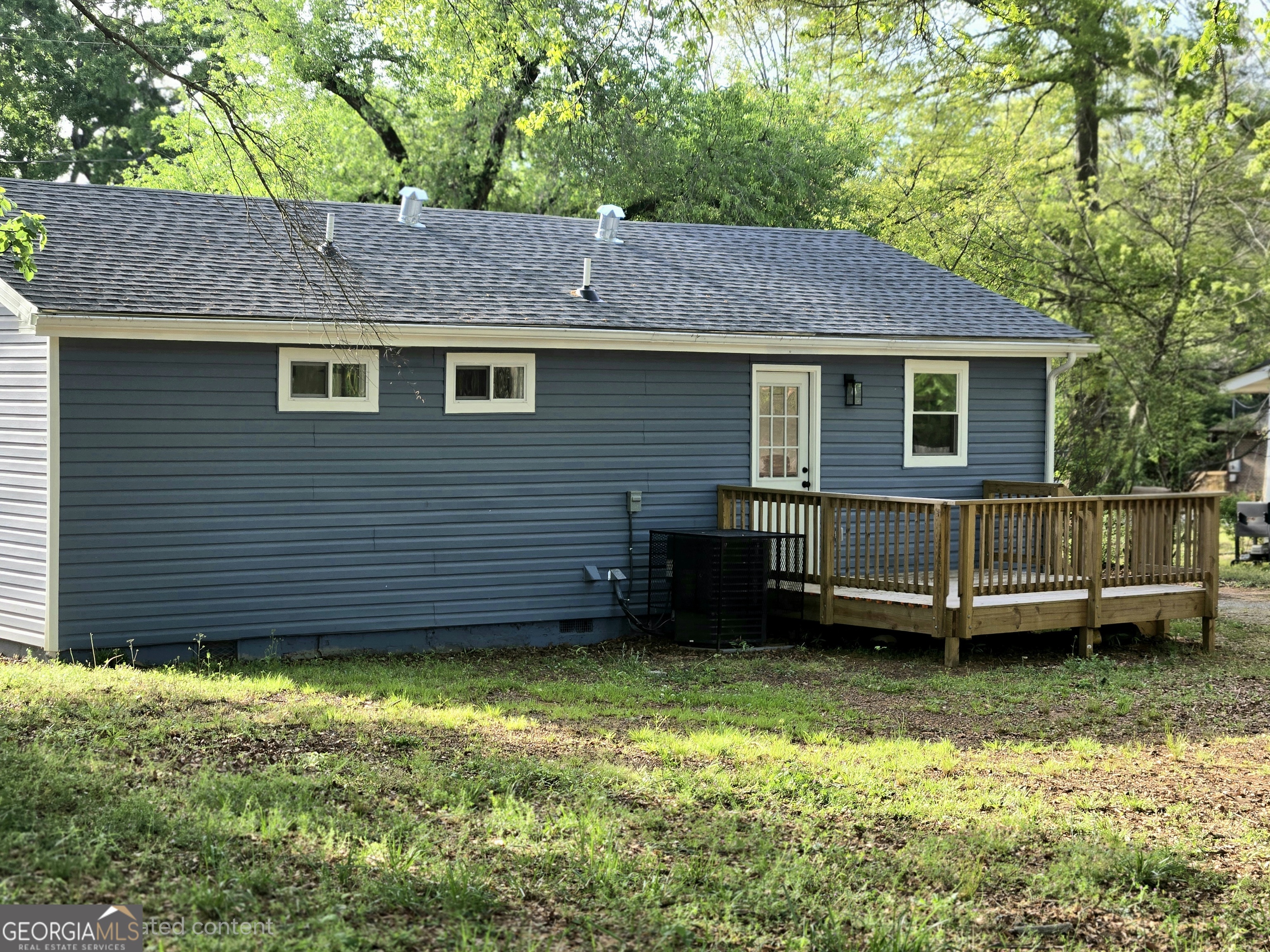 74 Carver Road McDonough, GA 30253 - Photo 3 of 19 a view of a house with a yard and sitting area