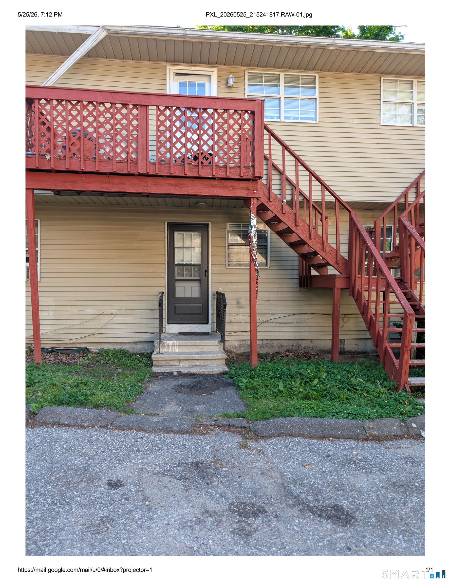 62 Angel Drive, Unit A Waterbury, CT 06708 - Photo 3 of 11 a front view of a house with a yard