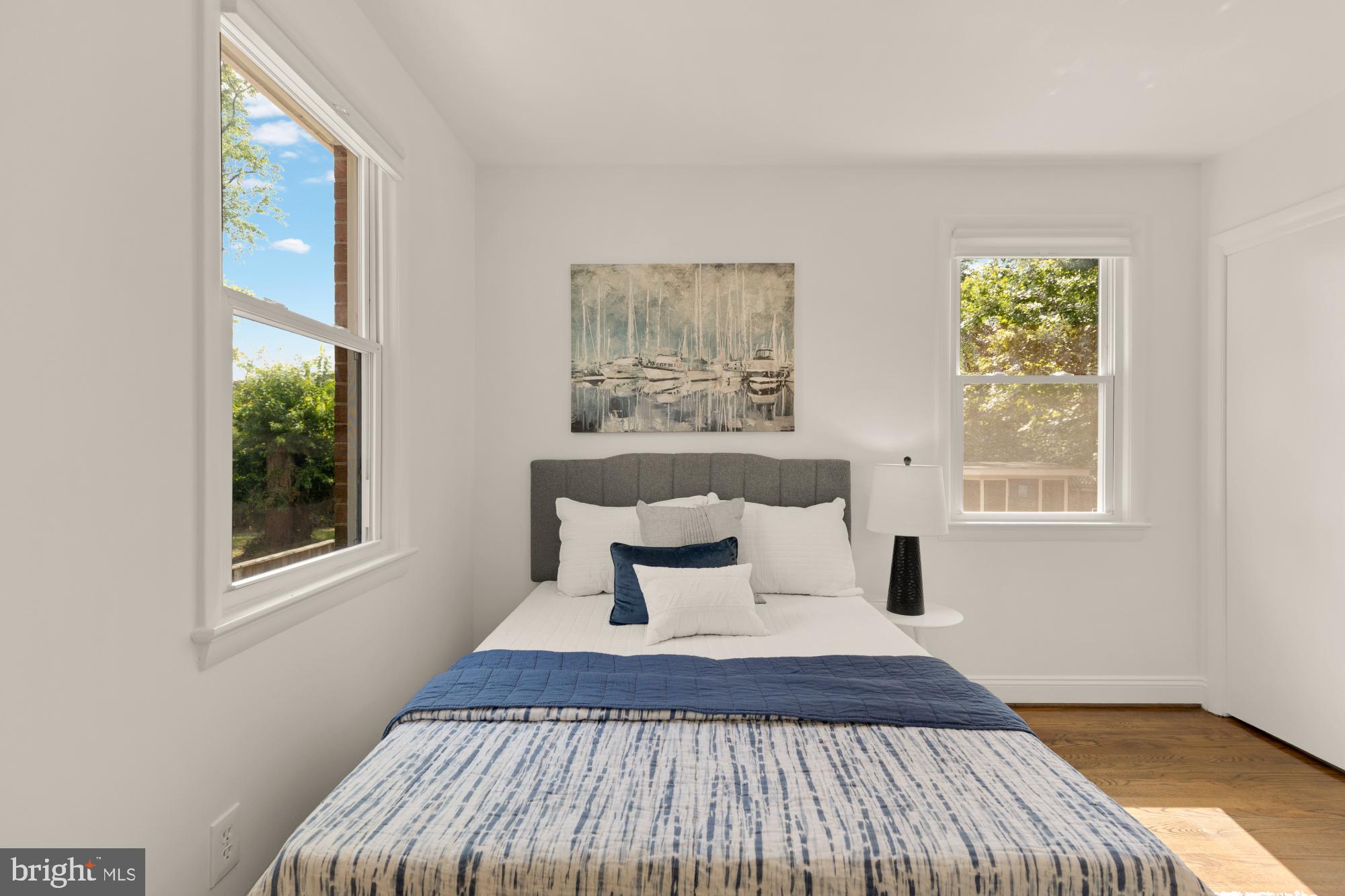 9811 Dallas Avenue Silver Spring, MD 20901 - Photo 18 of 45 a bedroom with a bed and window