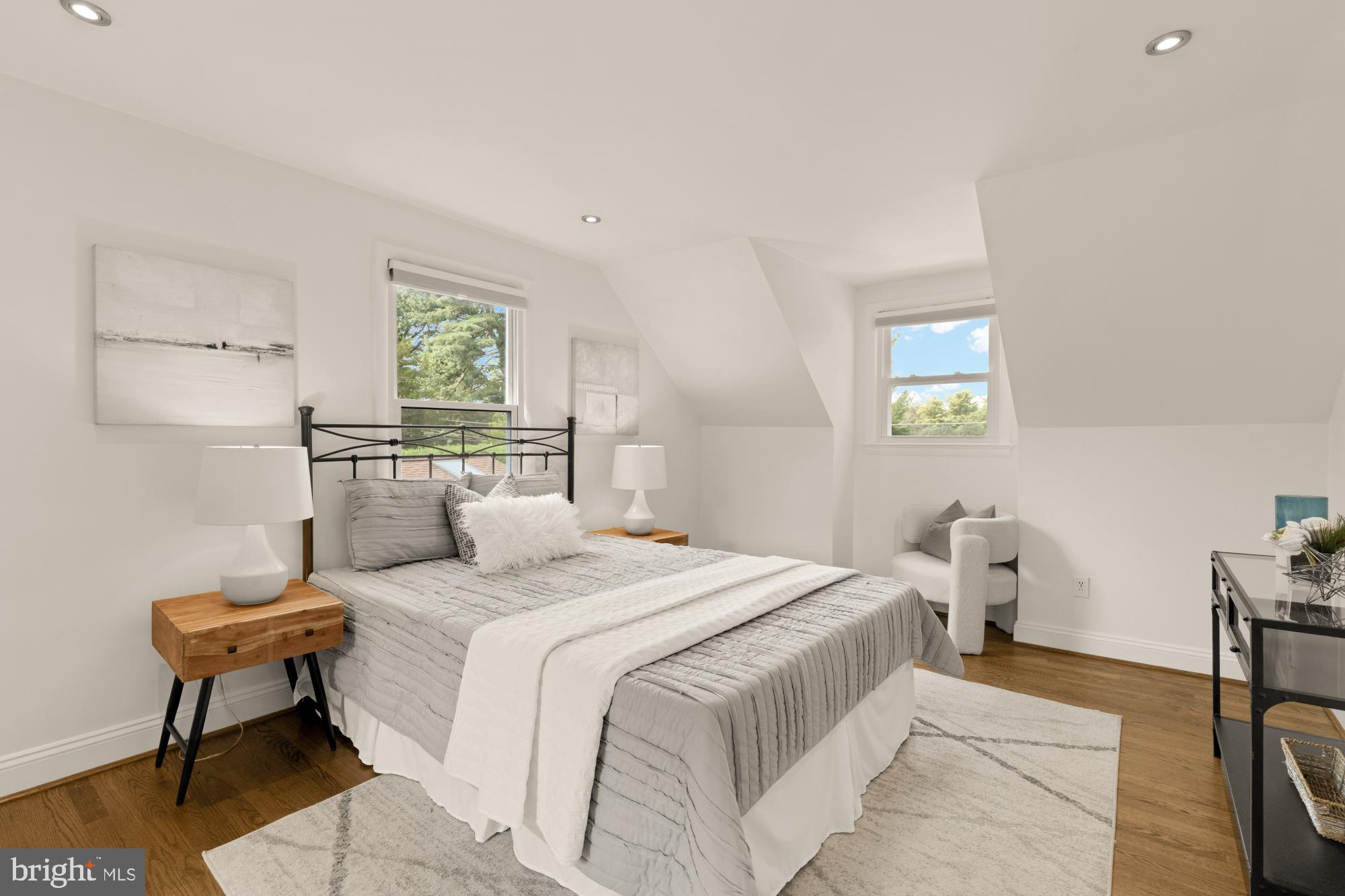 9811 Dallas Avenue Silver Spring, MD 20901 - Photo 23 of 45 a bedroom with a bed and a table