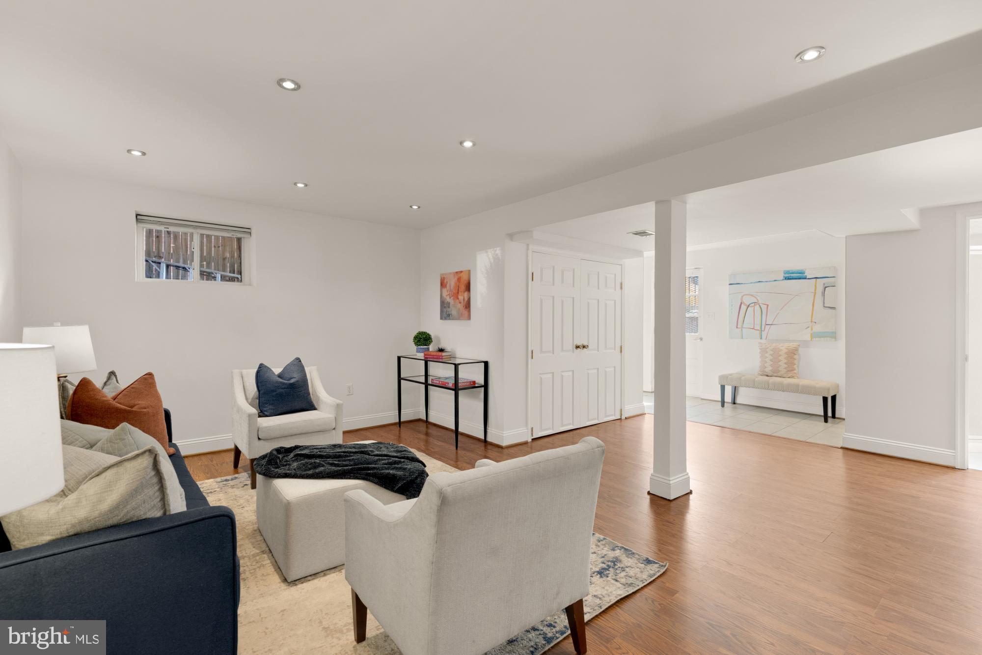 9811 Dallas Avenue Silver Spring, MD 20901 - Photo 33 of 45 a living room with furniture and wooden floor